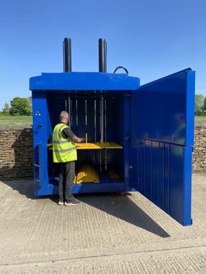 Engineer Servicing a Baler